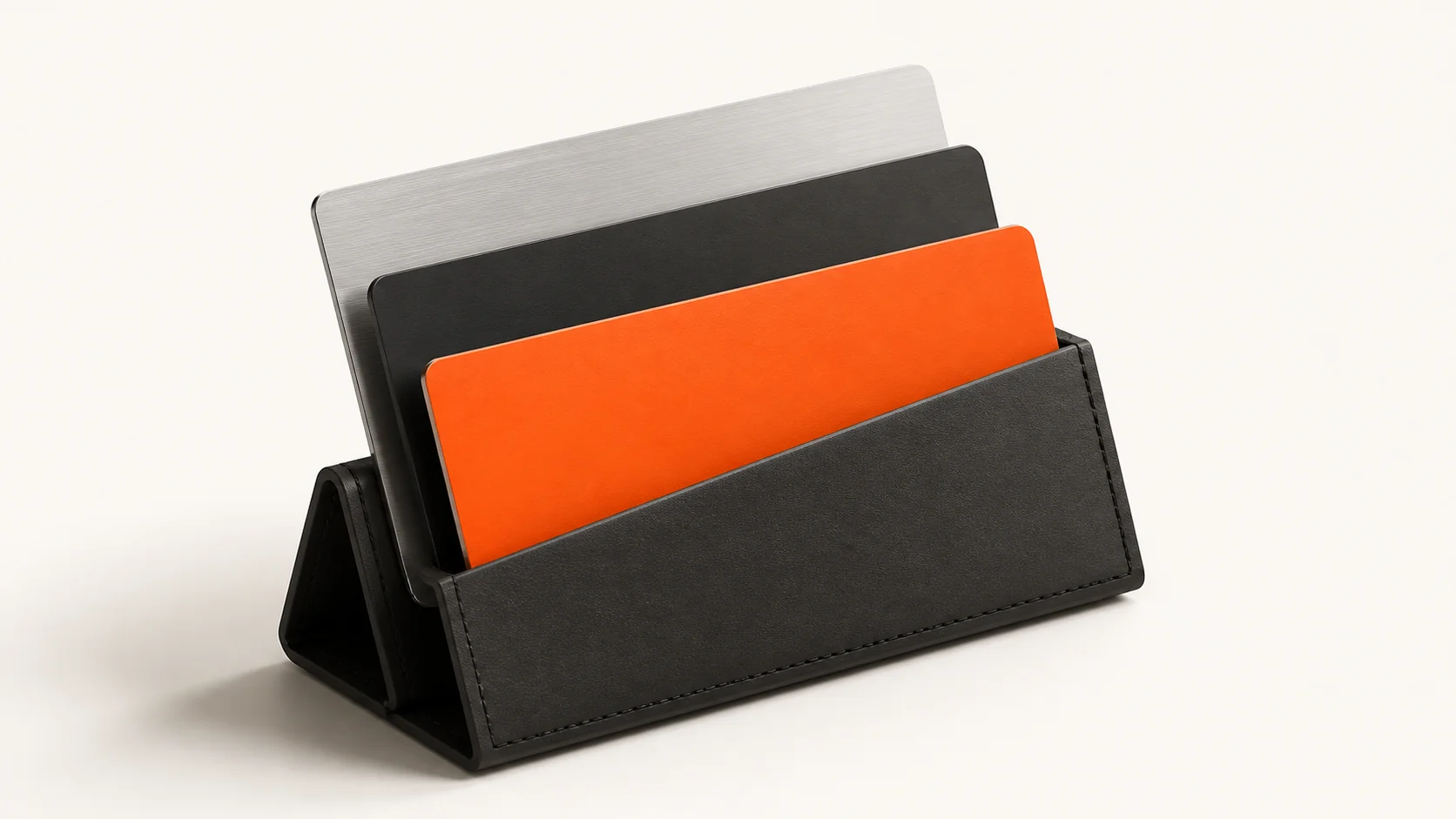 Editorial illustration: three blank payment-card forms in a dark holder
